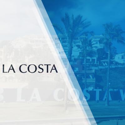Club La Costa text over a blue-tinted resort scene with palm trees and buildings in the background